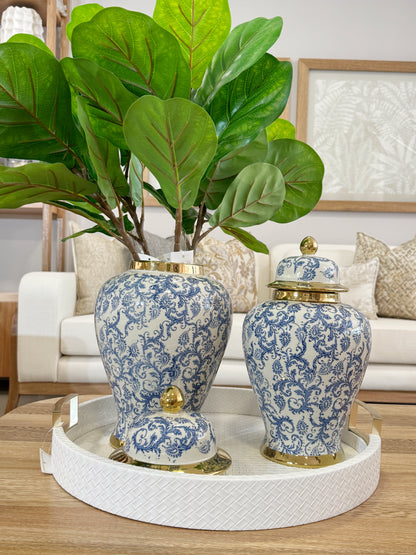 Bandeja decorativa redonda en polipiel blanca con asas doradas, diseño elegante para mesa de centro y sala