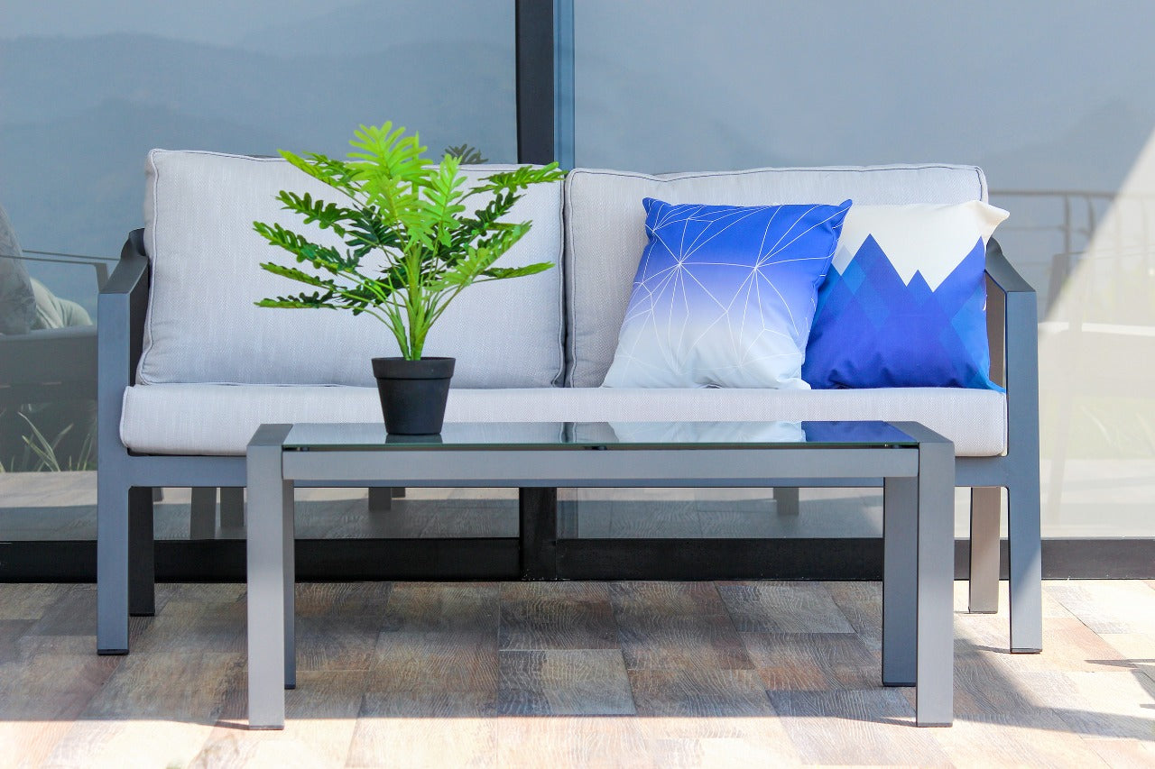 Vista de sala TARRAGONA, conjunto de sofás de aluminio con cajonería y mesa de centro
