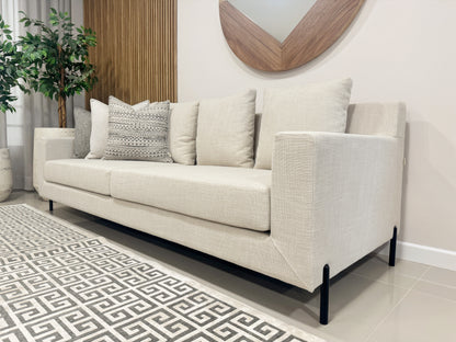 Sofá TOKIO tapizado en tela con patas metálicas negras, 240 x 87 x 87cm